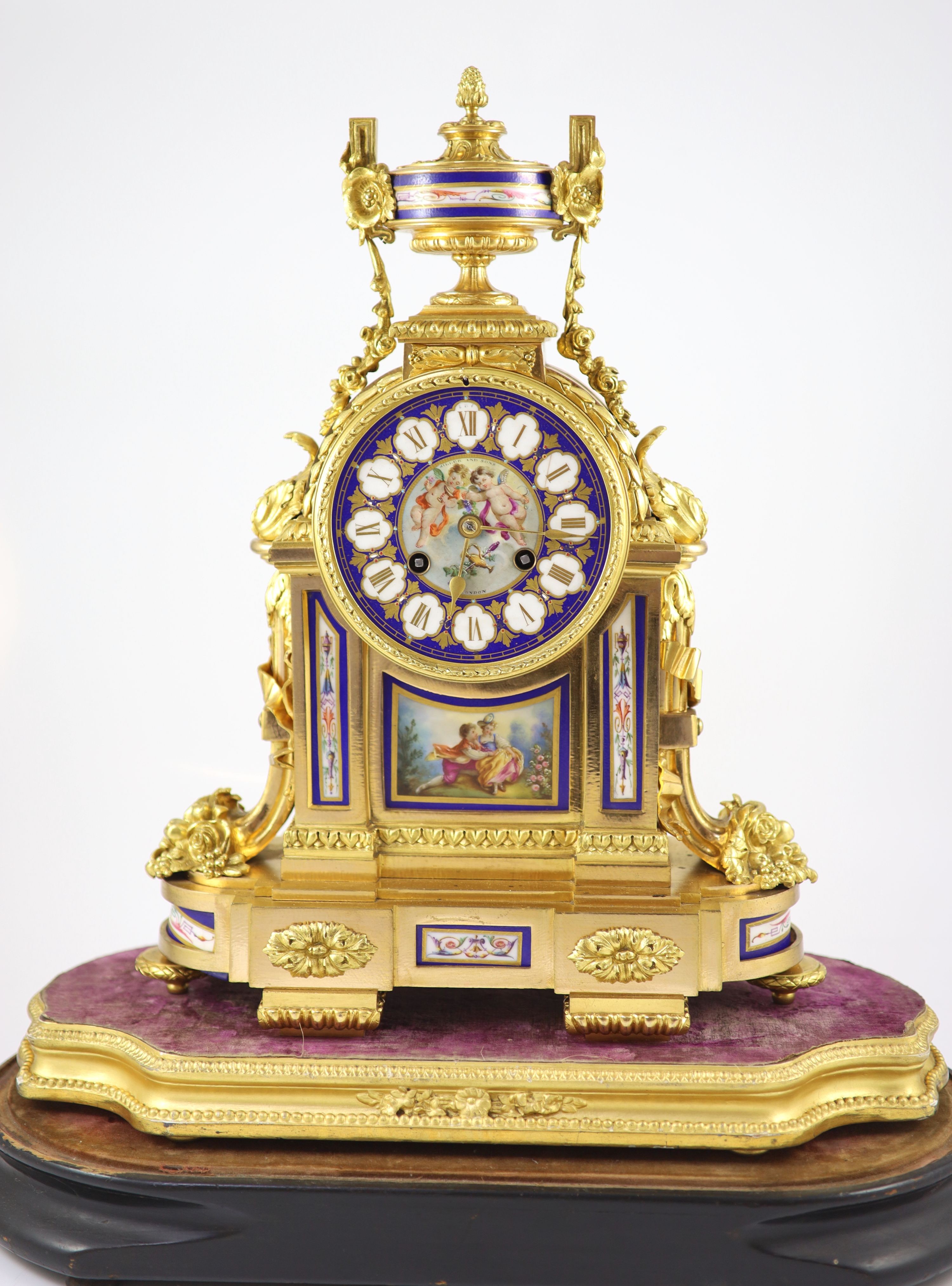 A 19th century French ormolu and Sevres style porcelain mantel clock H 46cm. W 35cm. D 16cm.